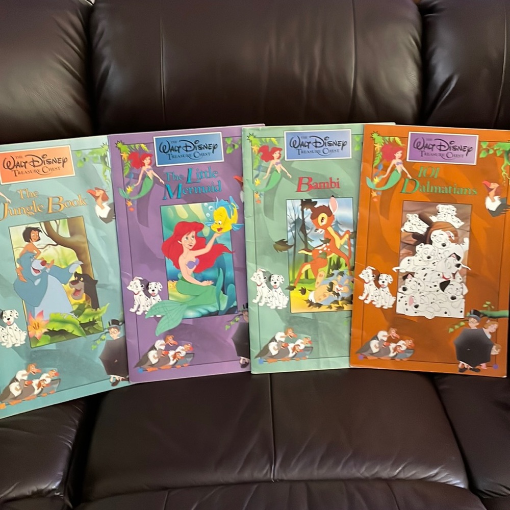 Set of 4 Disney large books.